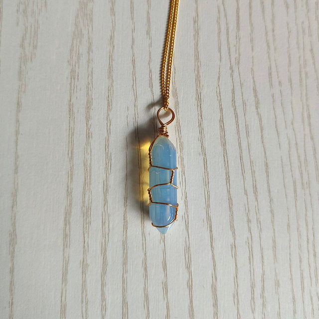 Natural stone pendant necklace with hexagonal shape and wire wrap