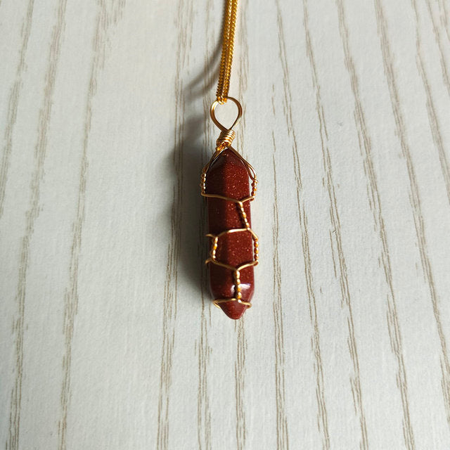 Natural stone pendant necklace with hexagonal shape and wire wrap